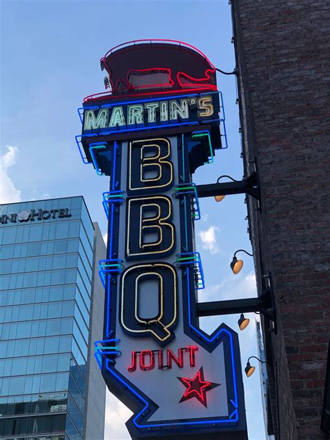 Martin's bbq joint - Southern Fried Chicken (14 Tenders) 14 southern fried chicken tenders, 1 pint each mac and cheese, baked beans and broccoli salad, 10 hushpuppies, 1 gallon of iced tea and BBQ sauce. Add a farmer's salad to your meal for an additional charge. $58.09.